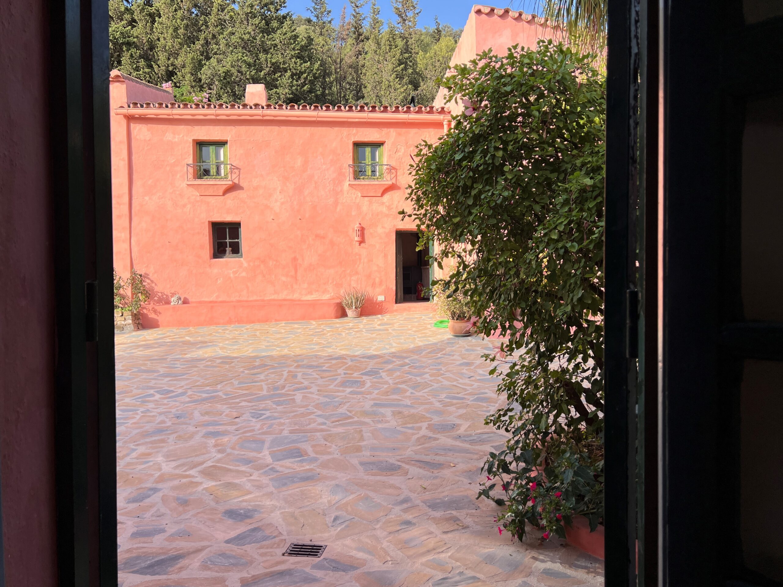 Cortijo patio from kitchen main house to entrance Casita